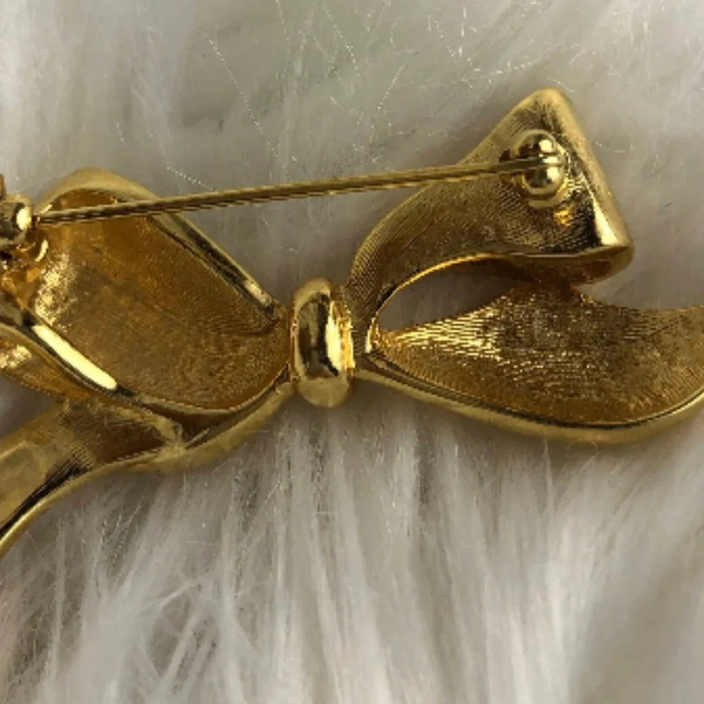 Vintage gold and crystal accent‎ bow brooch